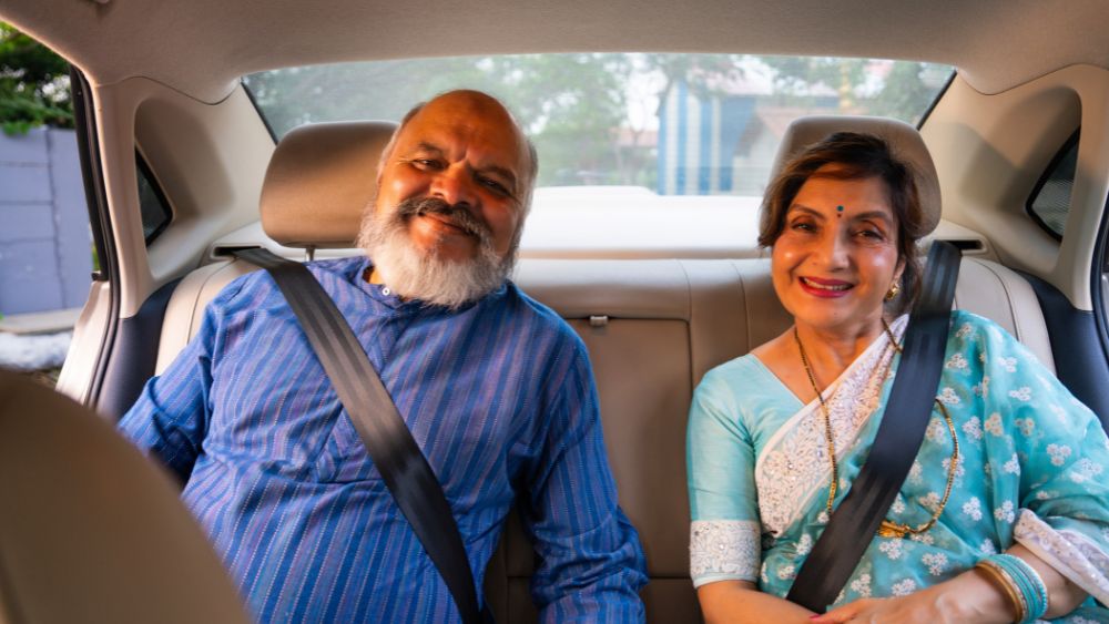 Senior Couple Travelling Comfortably In A Premium Car - Car Rentel Blog